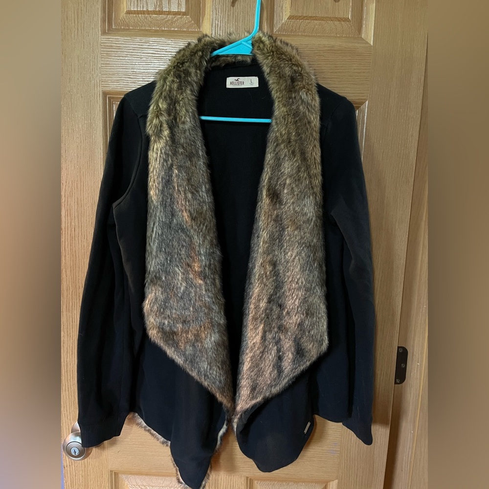 Size Large black with tan fur collar Hollister cardigan.